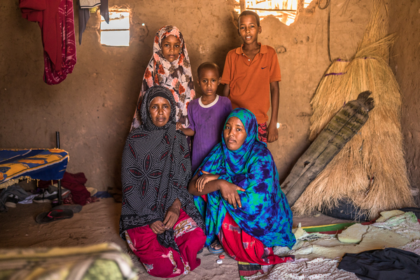 Family posing for photographer in Garissa, Kenya.